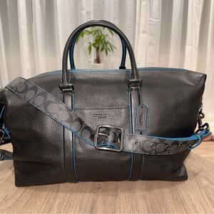 Elegant Black Duffel Bag with Blue Highlights